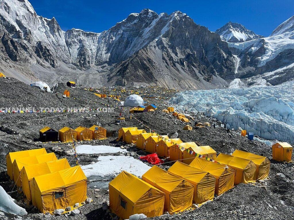 Expedition yellow tents on the Khumbu Glacier at Everest Base Camp Nepal