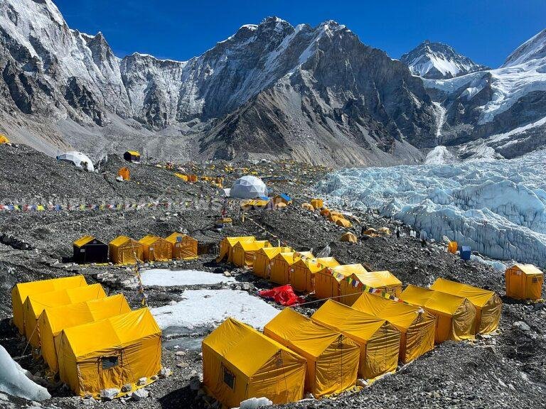 Expedition yellow tents on the Khumbu Glacier at Everest Base Camp Nepal